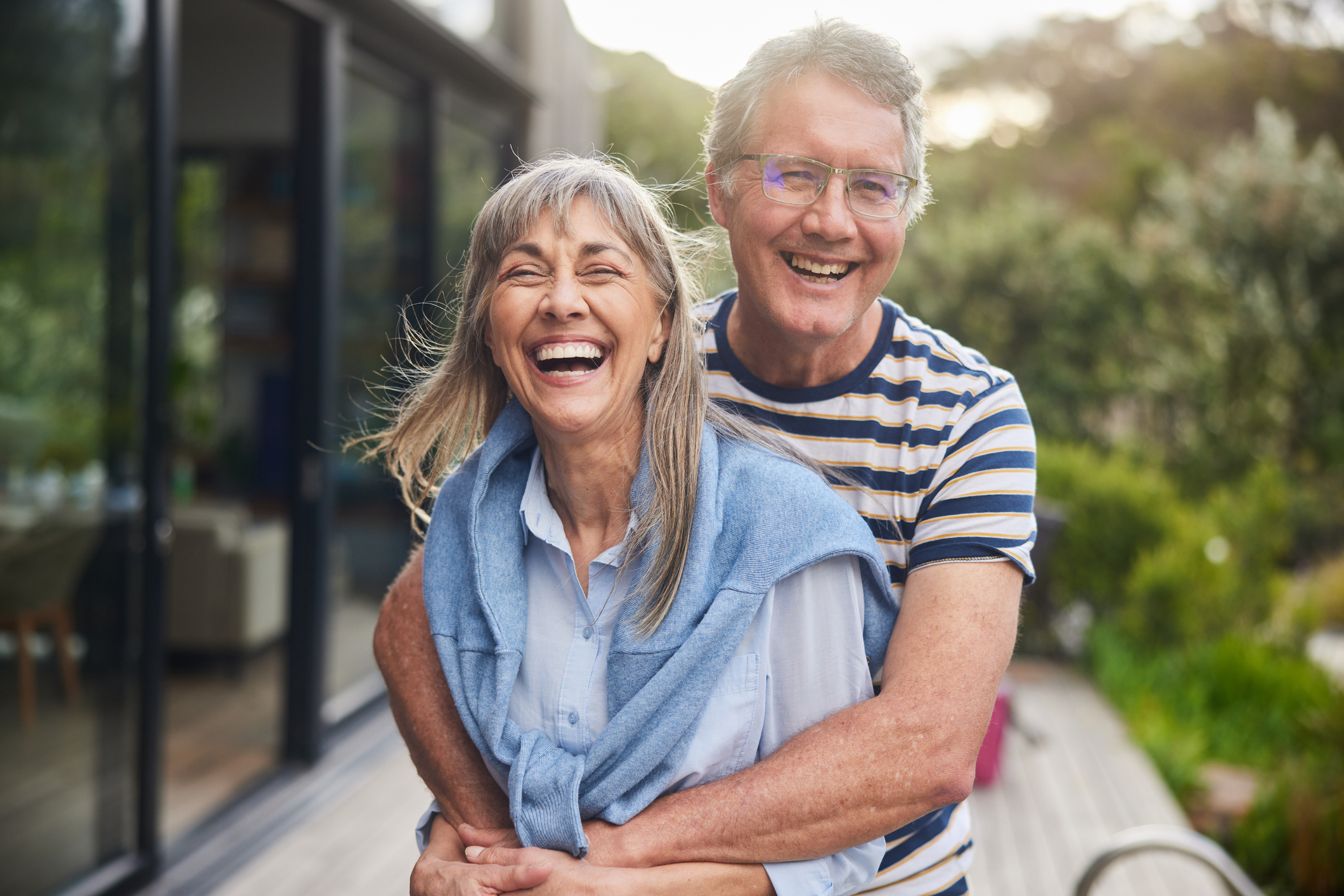 Happy senior couple enjoying a sunny day outdoors together