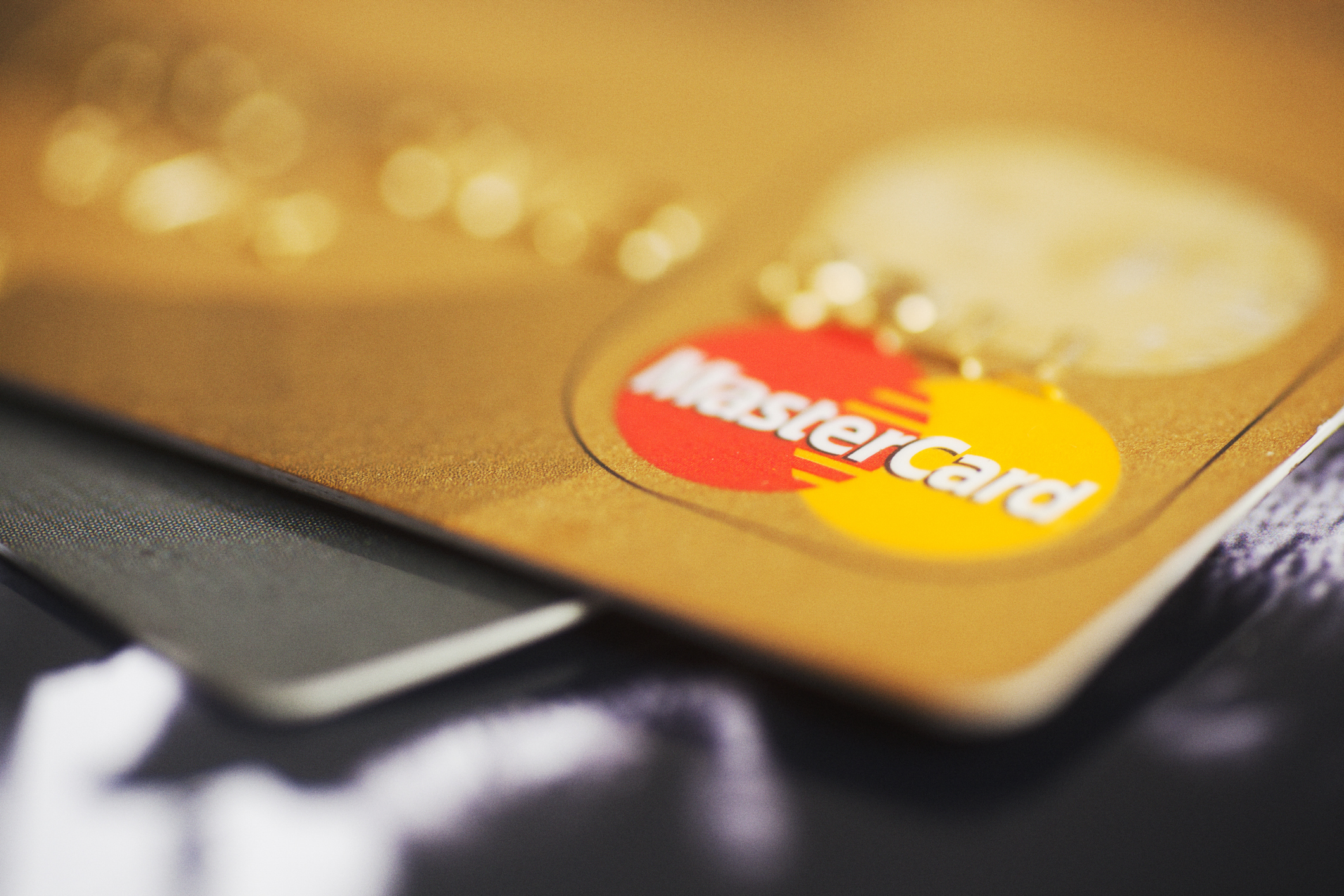 Close-up of a MasterCard credit card on a blurred background